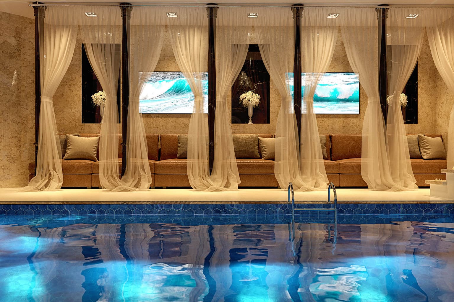 Indoor luxury pool with turquoise water, sheer curtains and warm ambient lighting
